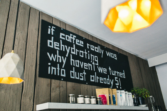coffee slogan on wall